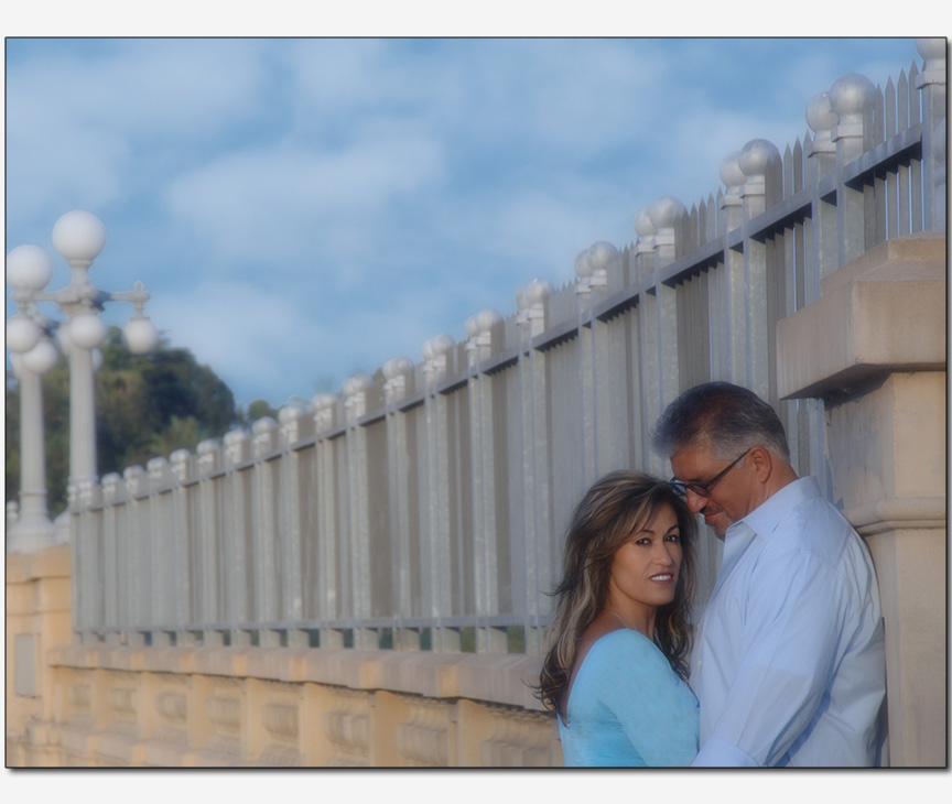 couple in blue under blue skies